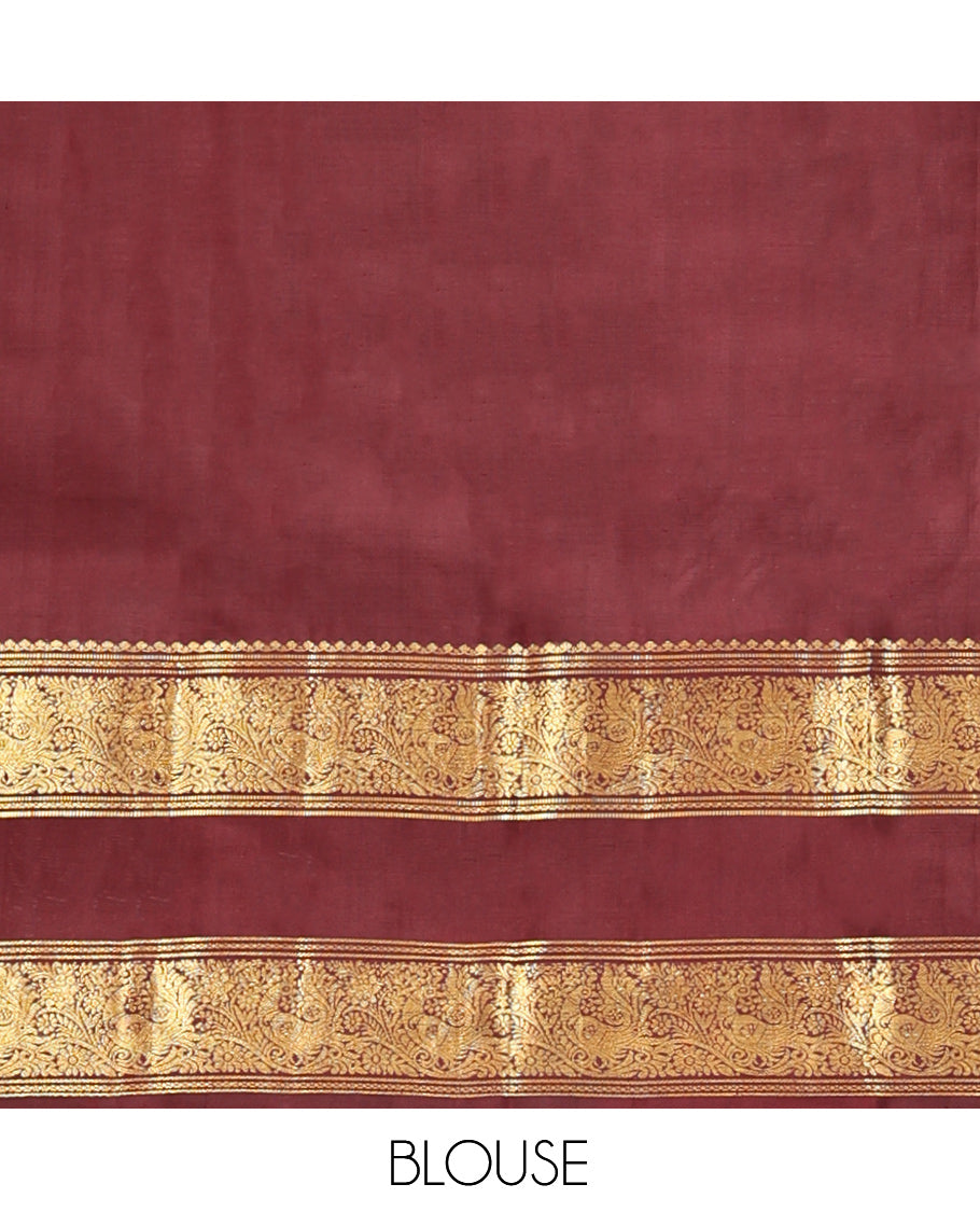 Maroon Kanchipuram Silk Saree, Majestically Detailed with Mayil-Chakra Buttas and Checks, Highlighted by Zari Border of Salngai, and Mayil Designs, Jaal Pallu, and Matching Blouse