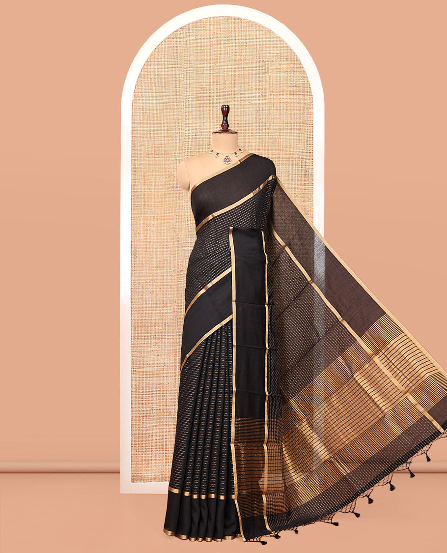Black Assam Silk Saree, Gleamed Up with Zari Stripes, Highlighted by a Traditional Zari Border, Gleaming Zari-Striped Pallu, and a Matching Blouse
