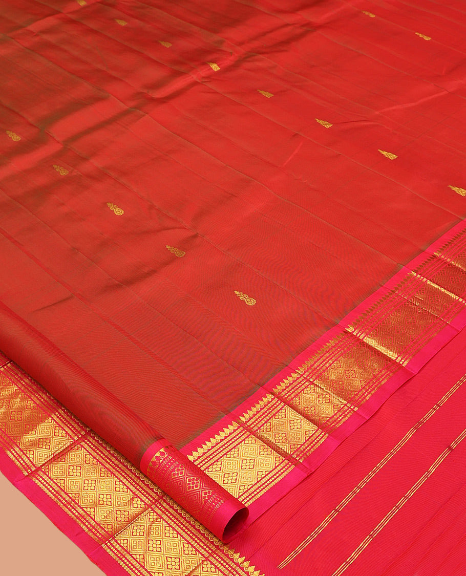 Rust Kanchipuram Silk Saree, Accentuated with Zari Buttas, Complemented by a Contrast Border of Thilakam Mokku, Banaras, Muthu, and Jaal Design, Pallu of Zari Design, and No Blouse