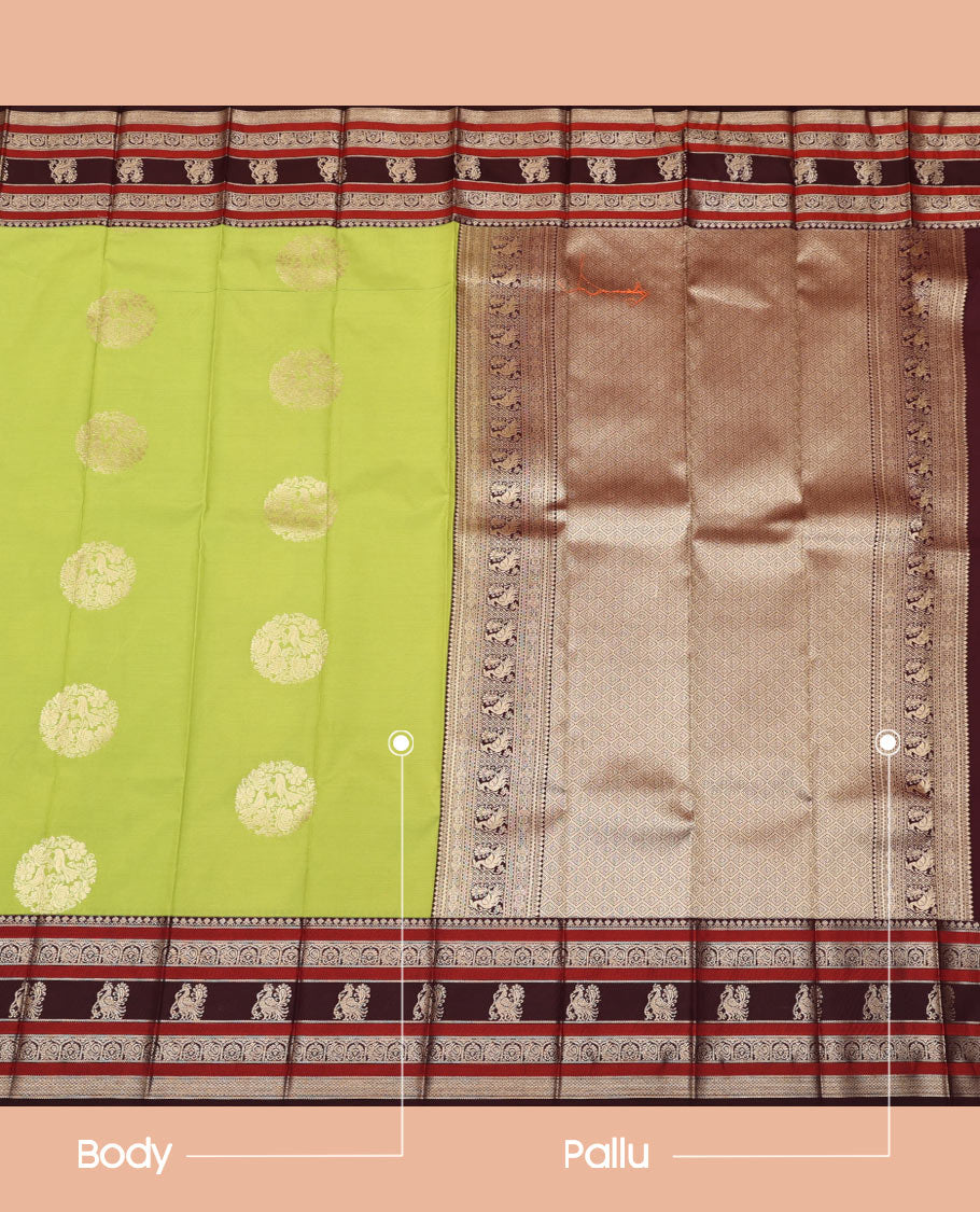 Green Budget Silk Saree, Detailed with Round Zari Buttas All Over Its Body, Complemented by Contrast Traditional Zari Designs Woven Border, Grand Jaal Pallu and Paired with a Contrast Blouse