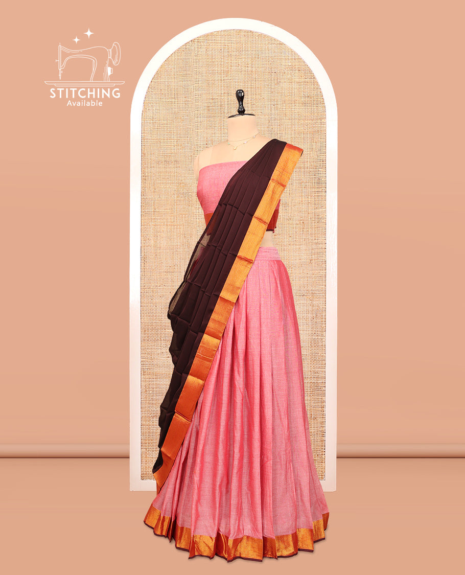 Pink Cotton Half-Saree Features Plain Skirt, a Contrast Zari Border, a Matching Blouse, and a Contrast Dhavani