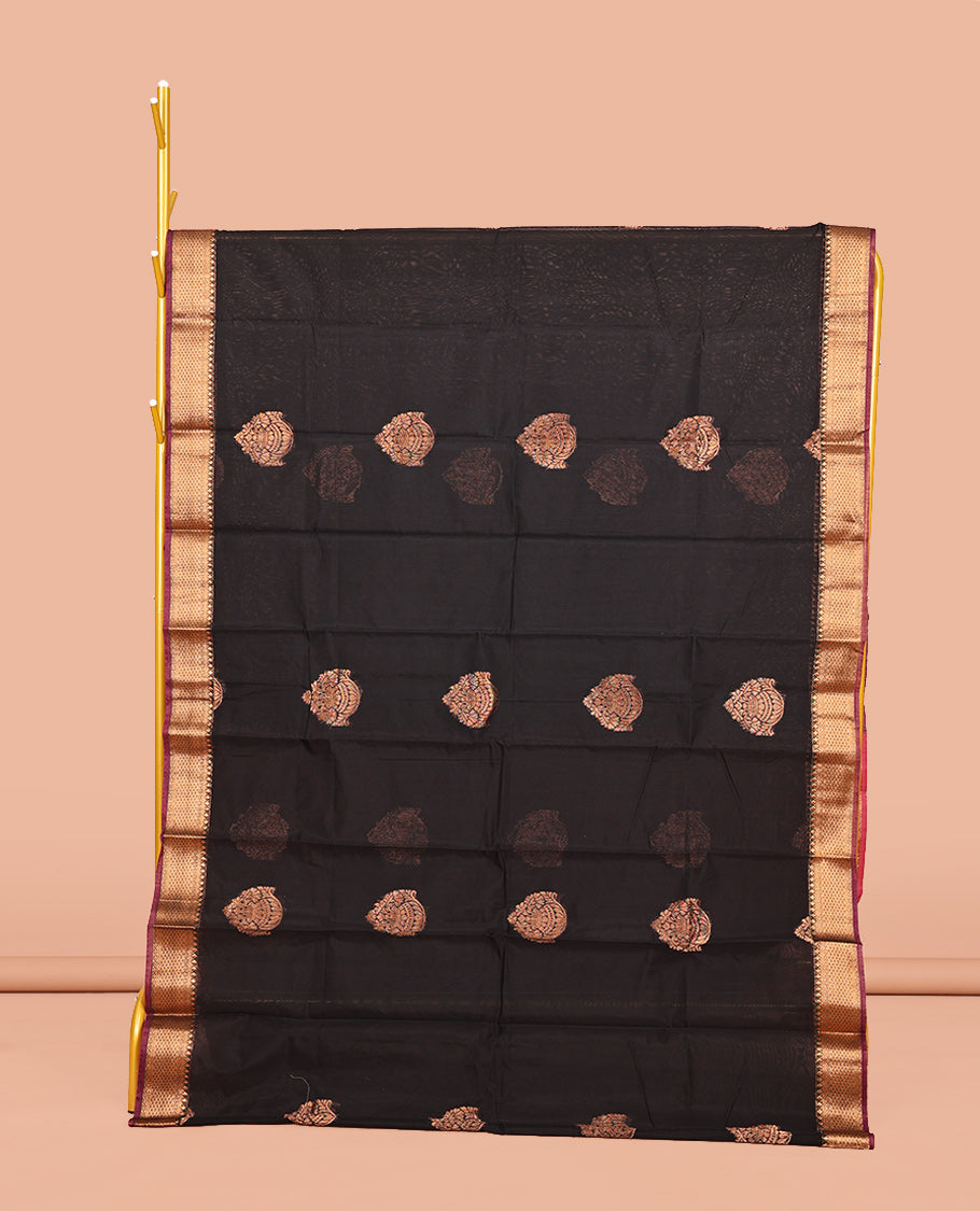 Black Semi-Silk Cotton Saree, Gleamed Up with Buttas on Its Body, Complemented by a Contrast Traditional Motifs Zari Woven Border, Intricately Designed Pallu, and Paired with a Contrast Blouse
