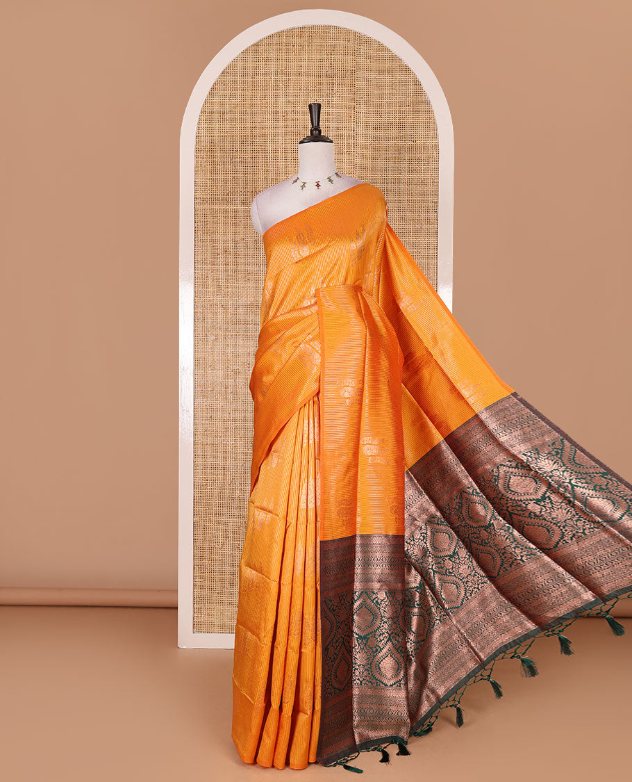 Borderless yellow stripes and zari floral buttas elite soft silk saree, contrast ogee patterned zari pallu, and contrast zari design blouse