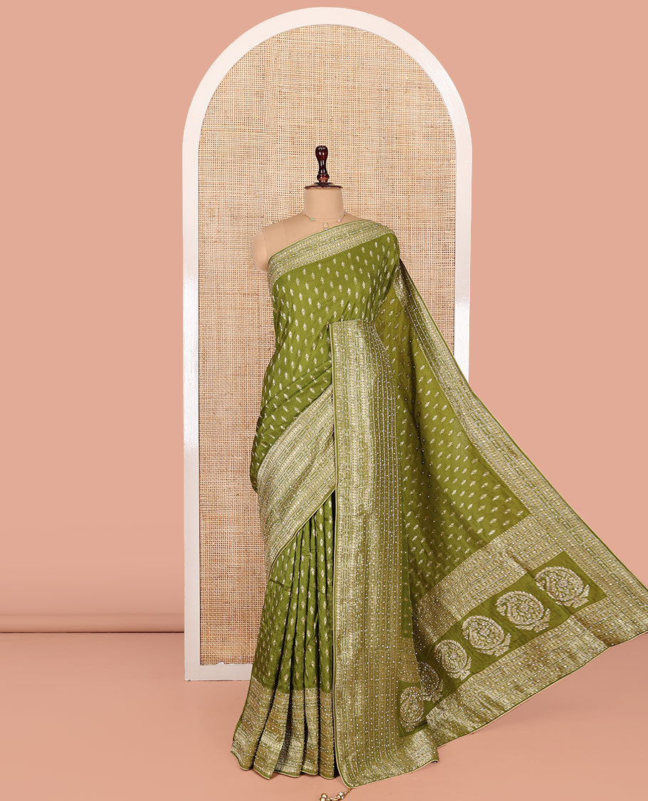 Green Dola Silk Saree, Adorned with Buttas on Its Body, Highlighted by Embroidered-Zari Work Border, Pallu of Embroidery and Zari Work, and Paired with a Matching Blouse