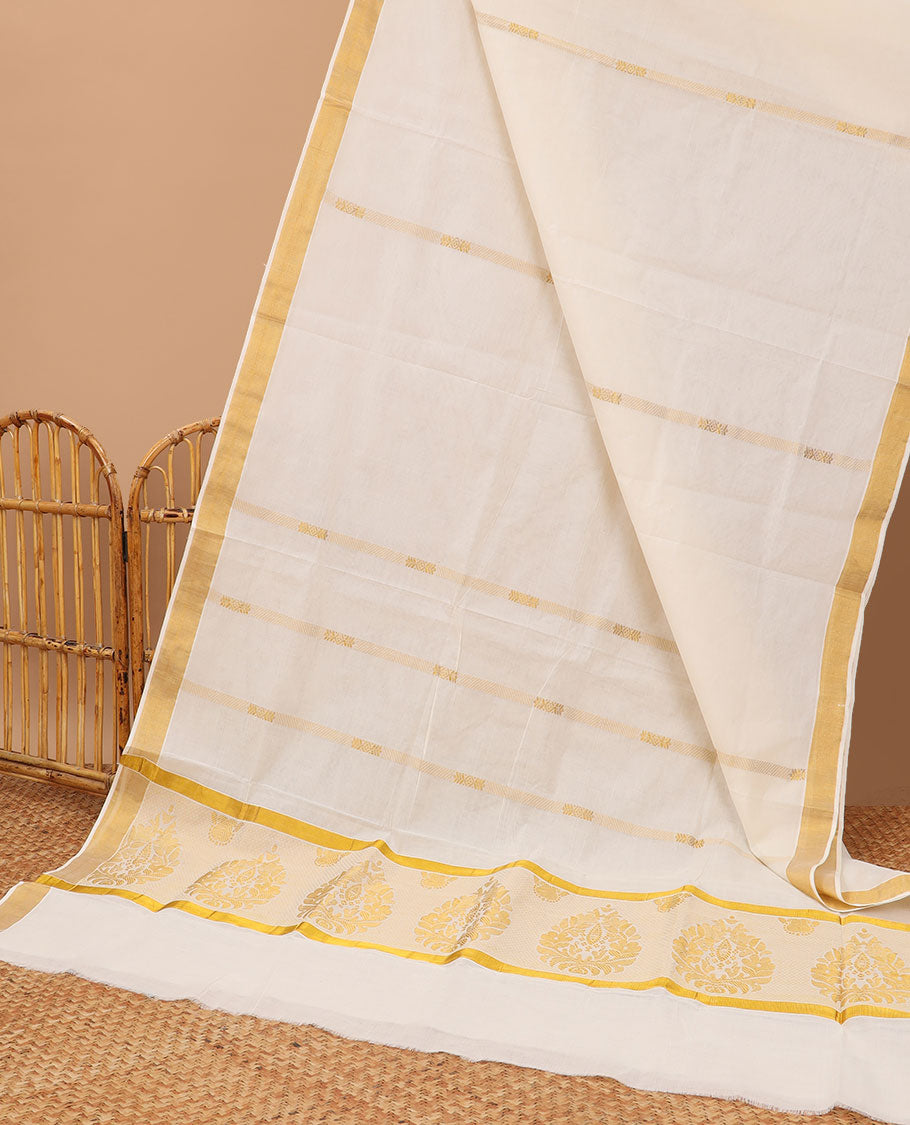 Cream kerala saree adorned with zari designs, zari border & pallu of intricate zari designs
