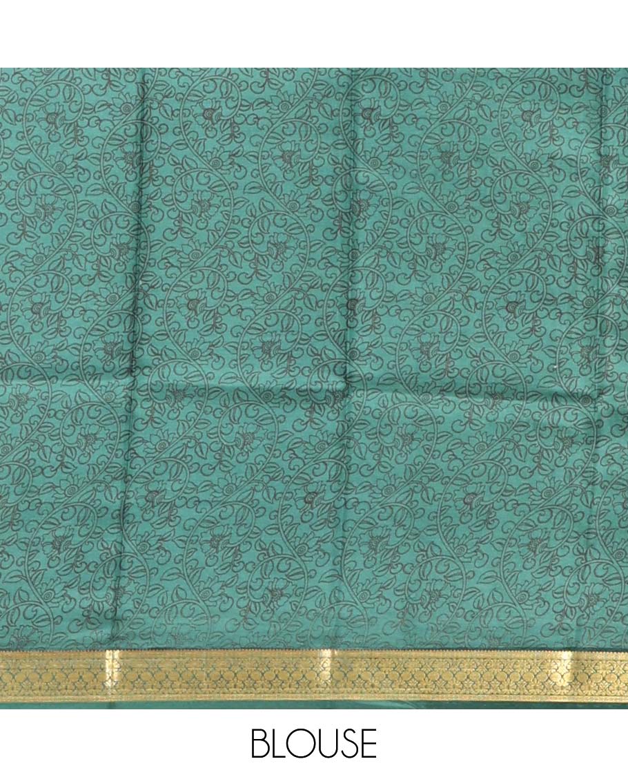 Green Printed Silk Saree, Steeped with Paisley Vine Designs, Highlighted by a Traditional Zari Border, Printed Pallu, and a Matching Blouse