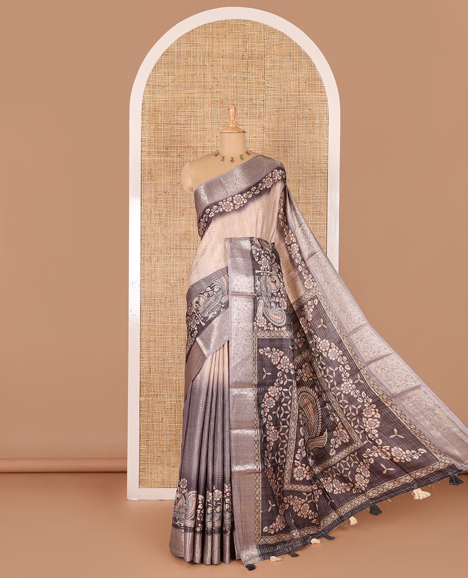Grey tri-ombre colored zari stripes, and kalamkari peacock printed semi-tussar saree, contrast floral creeper zari border, peacock printed pallu, and a contrast blouse of zari and print work