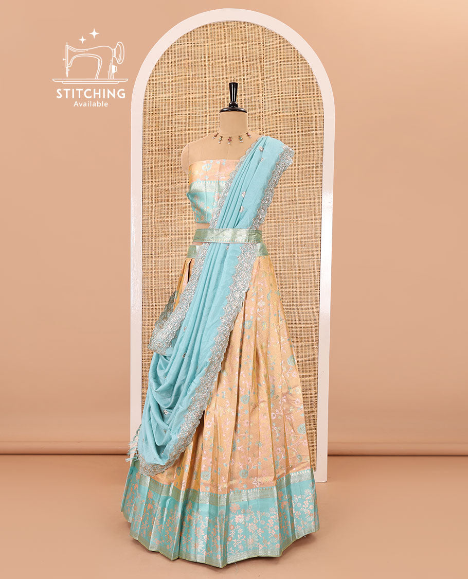 Peach banarasi half-saree, floral jaal thread weave with contrast floral thread bordered skirt, a matching blouse, and scallop embroidered dhavani with belt