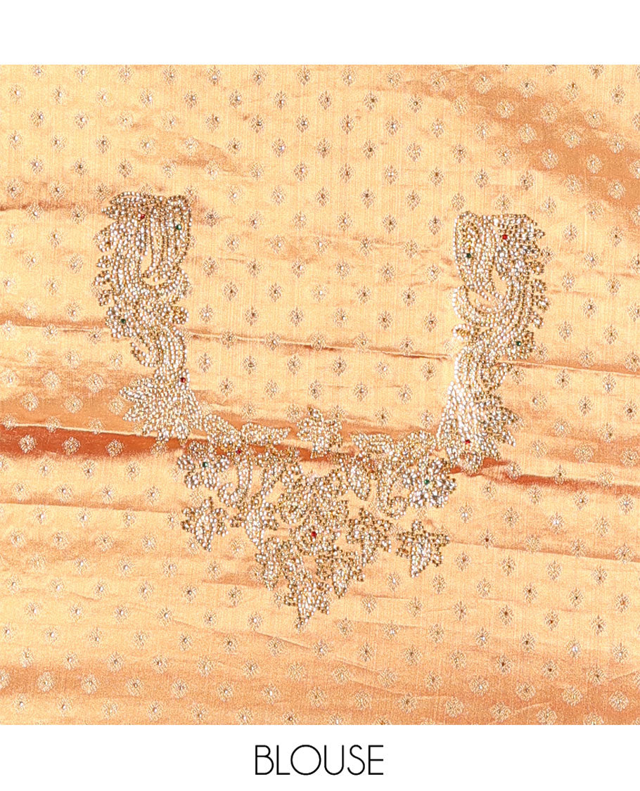 Gold Vastrakala Silk Saree, Decorated with Floral Jaal and Stone Work, Complemented by Contrast Traditional Zari and Stone Embroidered Scallop Border, Gleaming Grand Zari-Stone Work Pallu, and Paired with Contrast Heavy Stone Embroidered Blouse