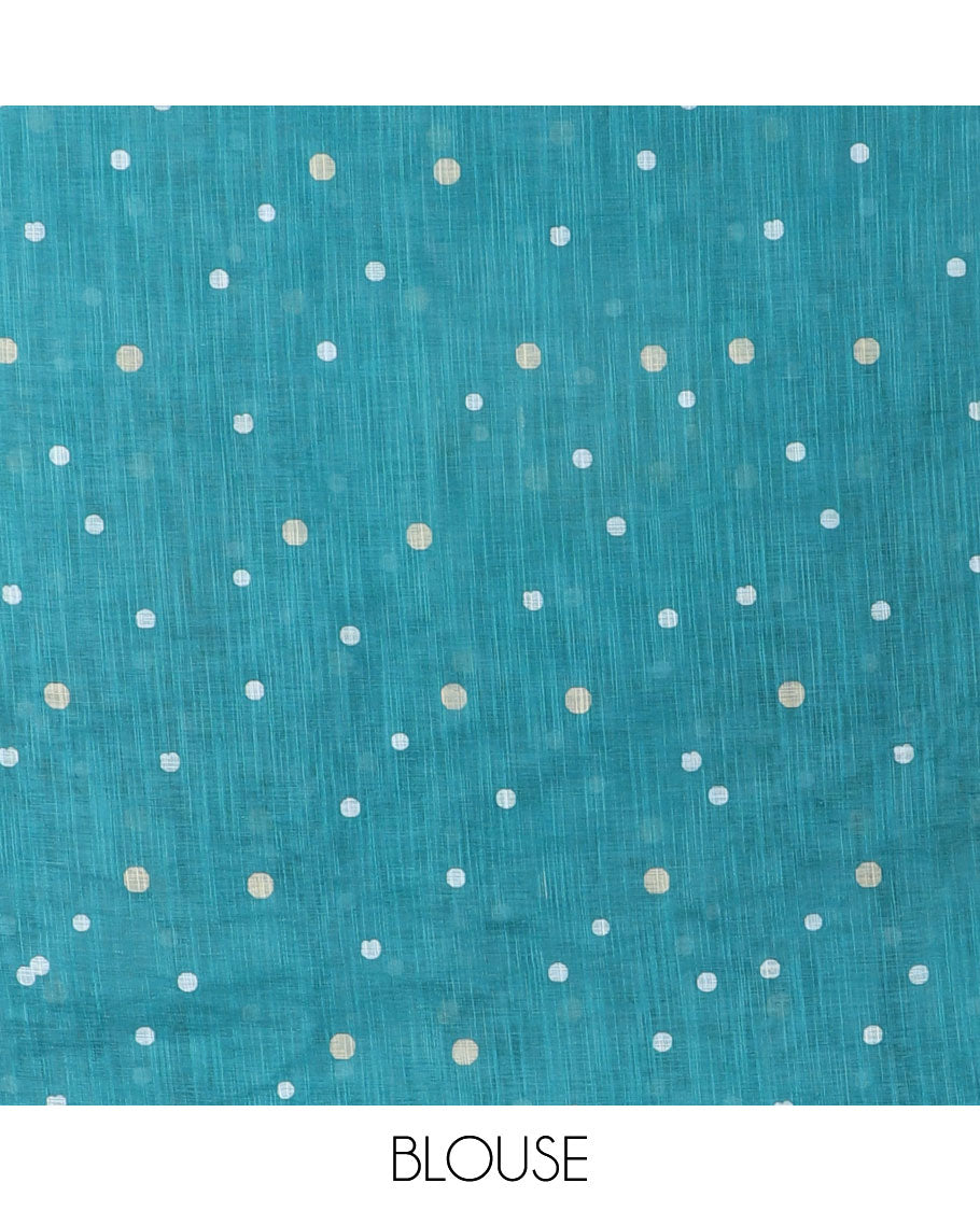 Borderless teal blue Christmas-theme Snow-fall, moon, trees, and deer motifs printed linen cotton saree with a contrast printed blouse