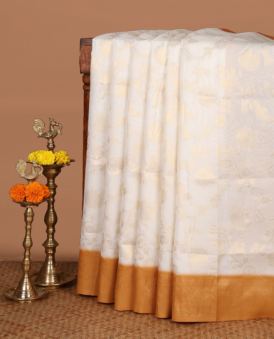 Cream with mustard zari jall weaving design banaras brasso saree with contrast jacquard border & weaving pallu along with butta design blouse