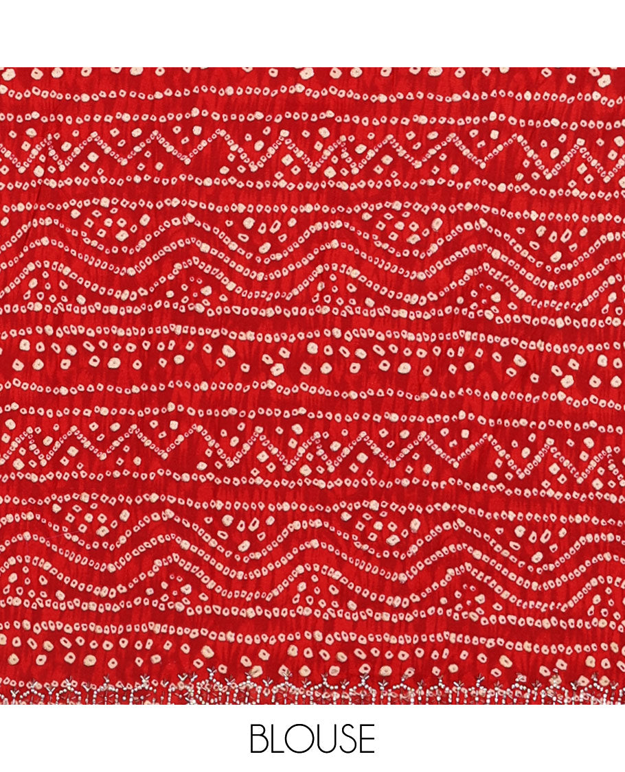 Yellow bandhani mango jhumka patch embroidered crunchy crushed saree, contrast border, and pallu of Swarovski stonework, bandhani dots, and bandhani printed blouse