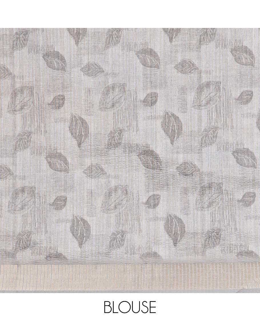 Cream leaf print tussar saree with tissue border & crush tissue pallu along with crush leaf print blouse