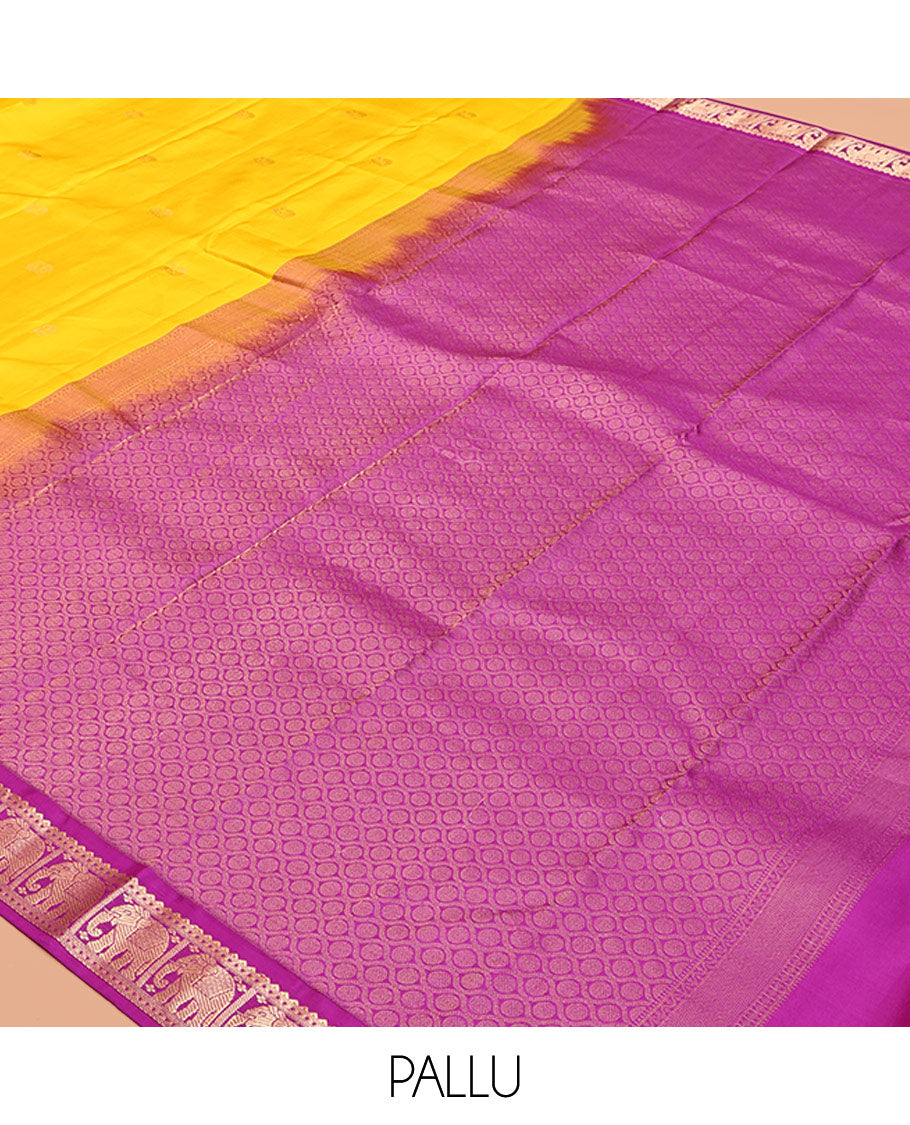 Yellow Vasundhara Silk Saree, Subtly Sparkled with Zari Buttas, Complemented by Contrast Border of Rekku, Chakram, and Yaanai Designs, Jaal Pallu, and a Contrast Blouse