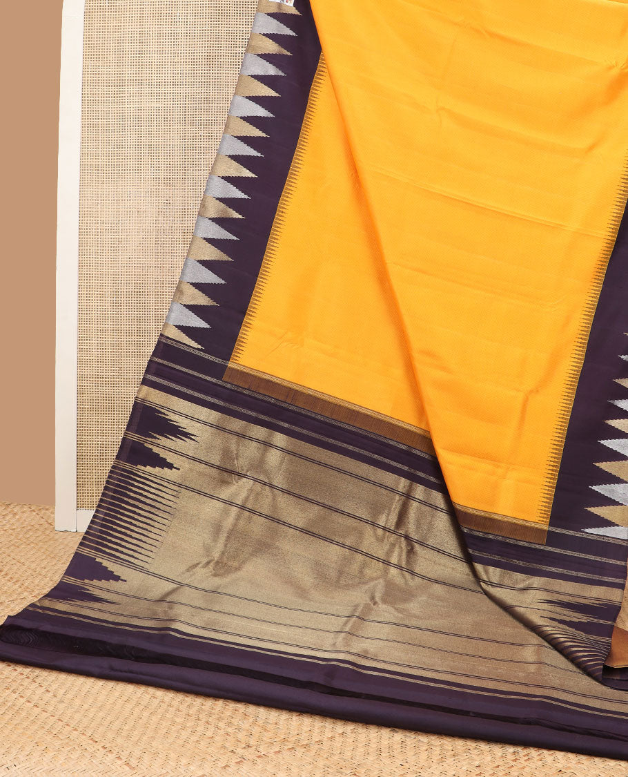 Yellow kancheepuram silk saree with contrast korvai temple border & bhavanji design pallu