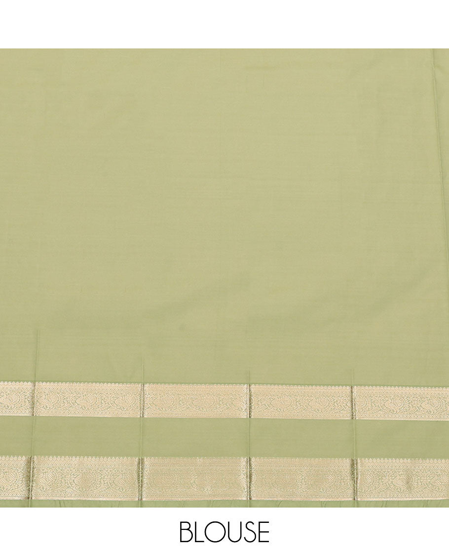 Pista Green Budget Silk Saree, Bedecked with Zari Buttas All Over Its Body, Highlighted by Traditional Zari Design Border of Peacock Designs, Gleaming Pallu of Jaal Designs, and Paired with a Matching Blouse