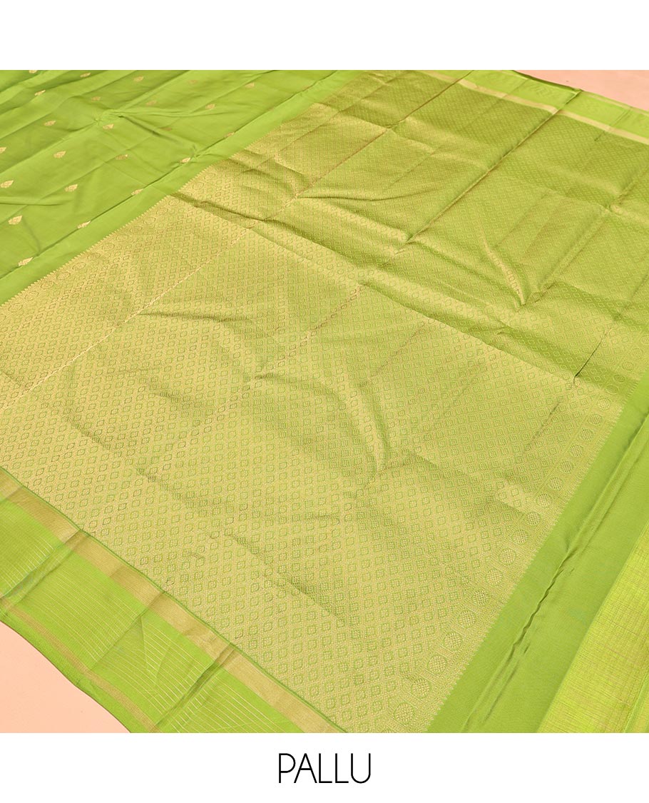 Green Vasundhara Lite Silk Mix Saree, Subtly Sparkled with Zari Buttas All Over Its Body, Highlighted by a Zari Striped Border, Jaal-Patterned Pallu, and Paired with a Matching Blouse
