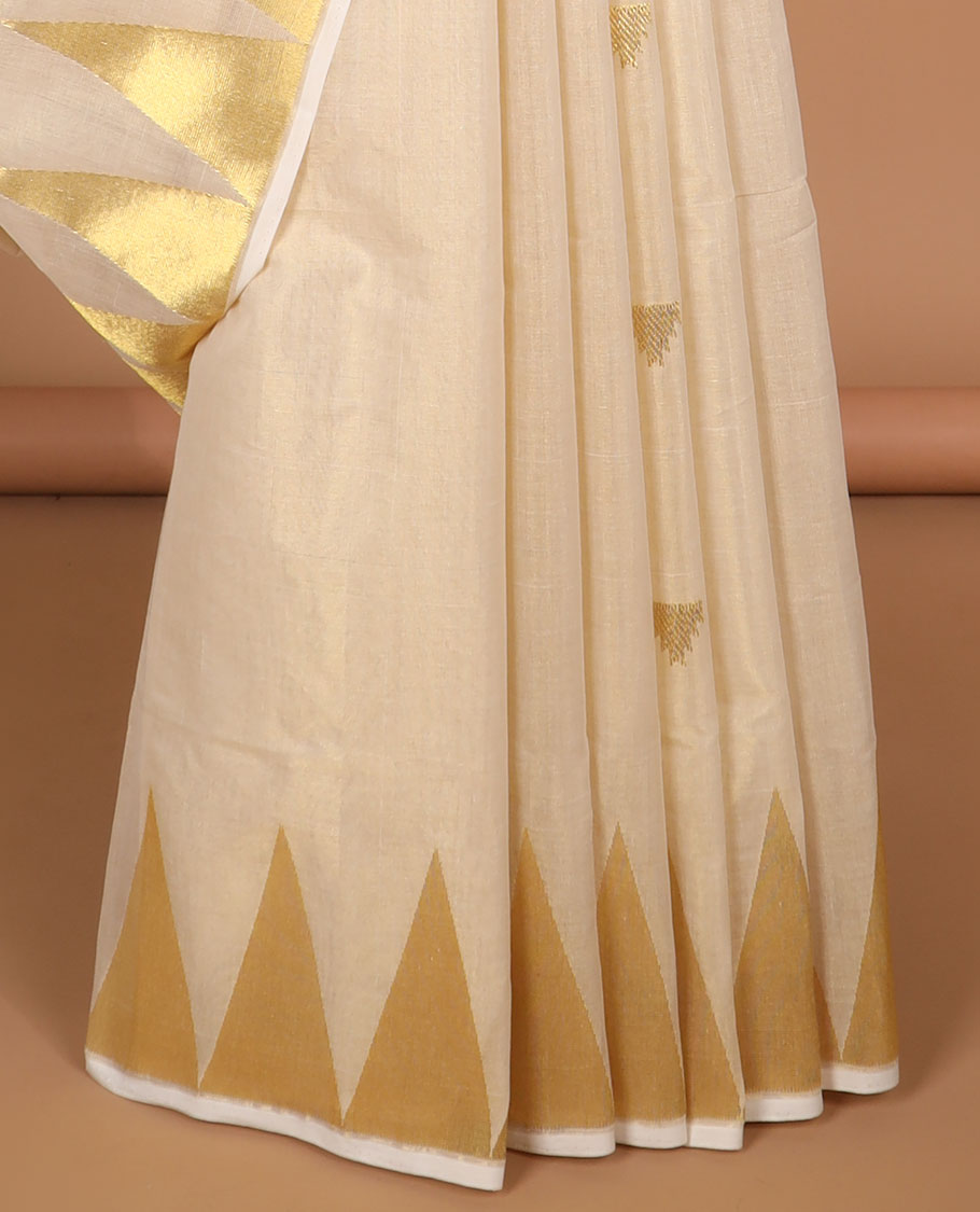 Cream triangle motifs kasavu saree with self temple border & gold zari striped pallu