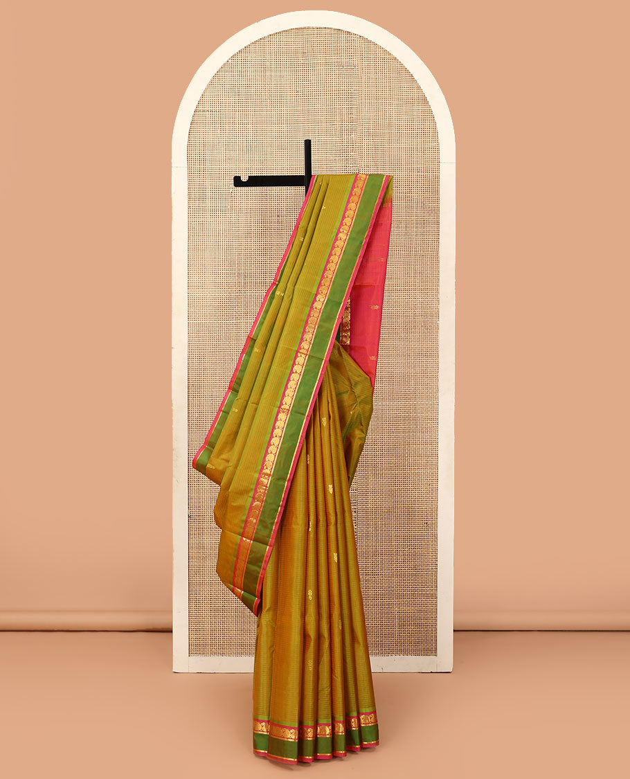 Green striped and buttas Kanchipuram silk saree, contrast rettai pettu border of manga and kathir designs, and zari design pallu
