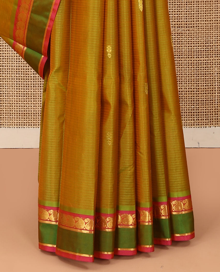Green striped and buttas Kanchipuram silk saree, contrast rettai pettu border of manga and kathir designs, and zari design pallu