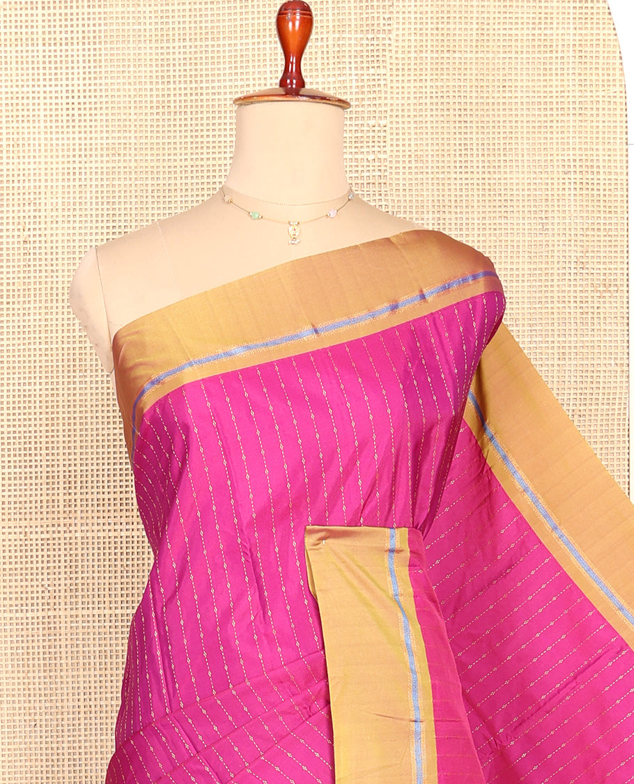 Pink Aarani Silk Saree, Elevated with Zari Stripes All Over Its Body, Complemented by a Contrast Border, Pallu of Stripes, and Paired with a Contrast Blouse