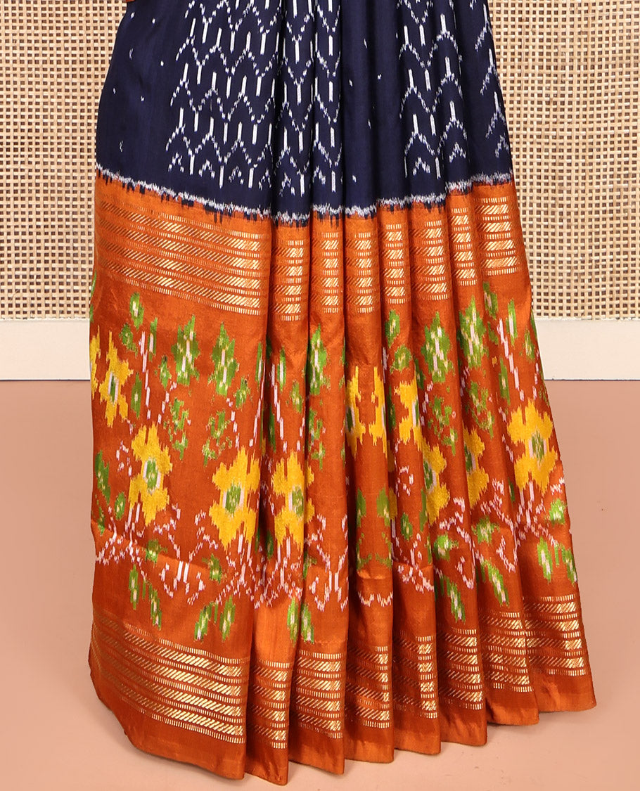 Blue Pochampally Ikat Silk Saree, Embellished with Ikkat Buttas on Its Body, Complemented by a Contrast Intricately Ikkat Woven Border, Pallu of Ikkat Weave, and Paired with a Contrast Blouse
