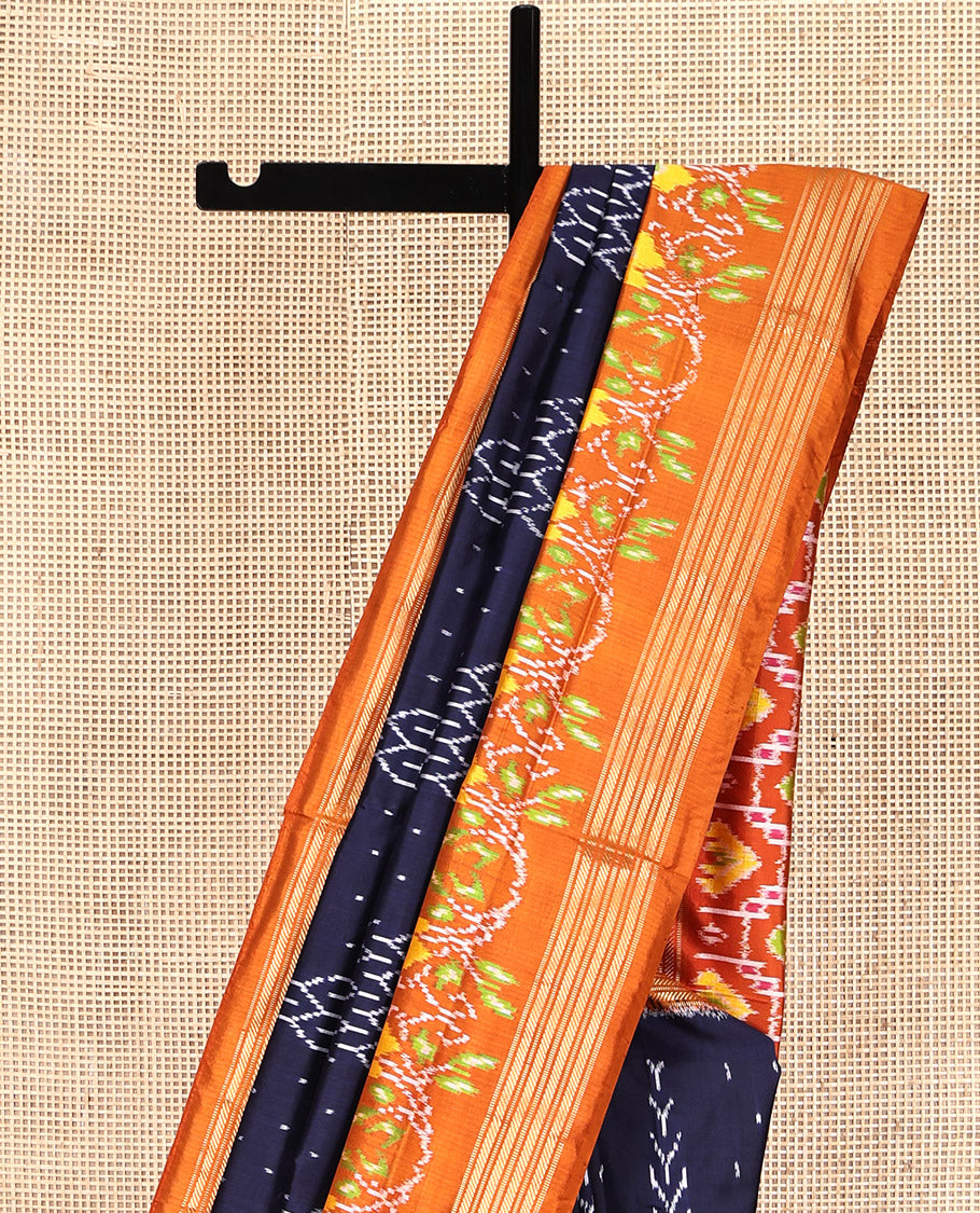 Blue Pochampally Ikat Silk Saree, Embellished with Ikkat Buttas on Its Body, Complemented by a Contrast Intricately Ikkat Woven Border, Pallu of Ikkat Weave, and Paired with a Contrast Blouse
