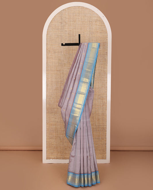 Brown zari buttas Kanchipuram silk saree, contrast one-sided korvai border of panner sombu,banaras & jaal & floral design pallu