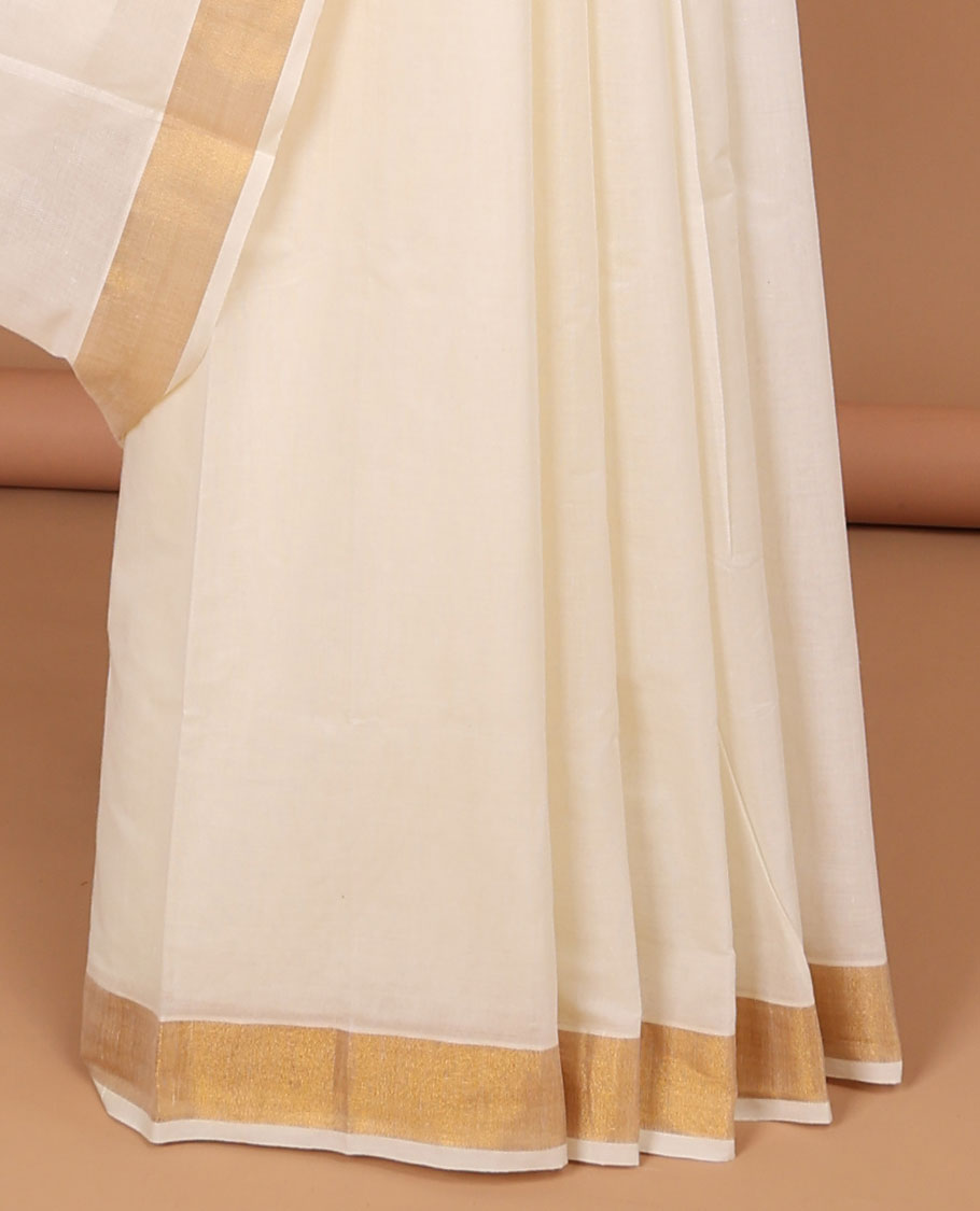 Cream kerala saree, zari border & pallu of zari designs