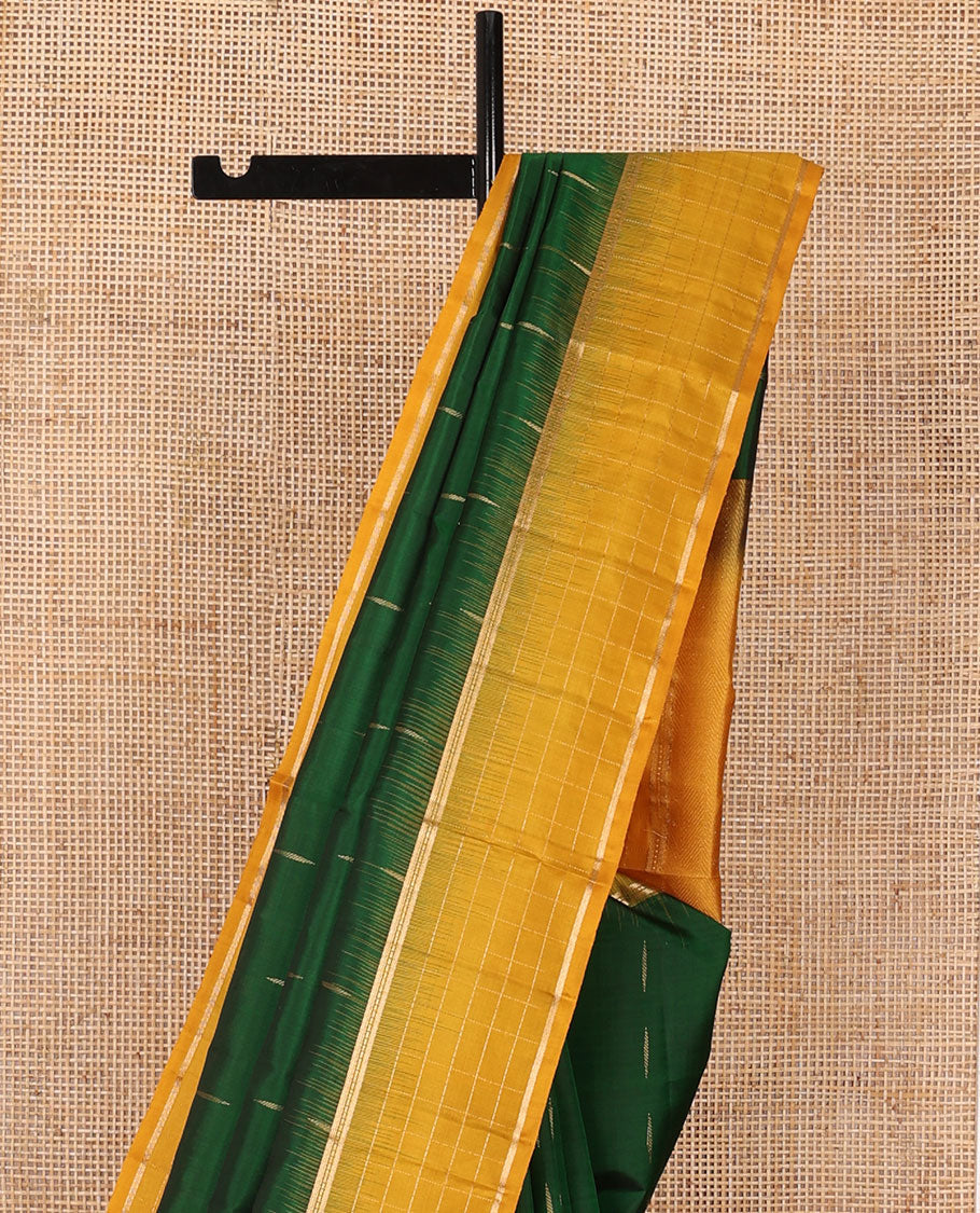Green malli mokku buttas soft silk saree, contrast zari checked border of banaras & muthu designs & chevron pallu
