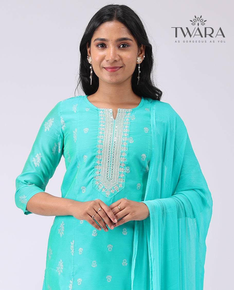 Twara light blue floral embroidered round neck, 3/4 sleeve , knee lenght straight cut kurti with straignt pants & plain dupatta
