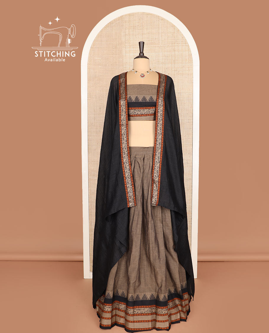 Brown cotton half-saree, plain with contrast traditional motifs woven bordered skirt, matching blouse, and a contrast bordered dhavani
