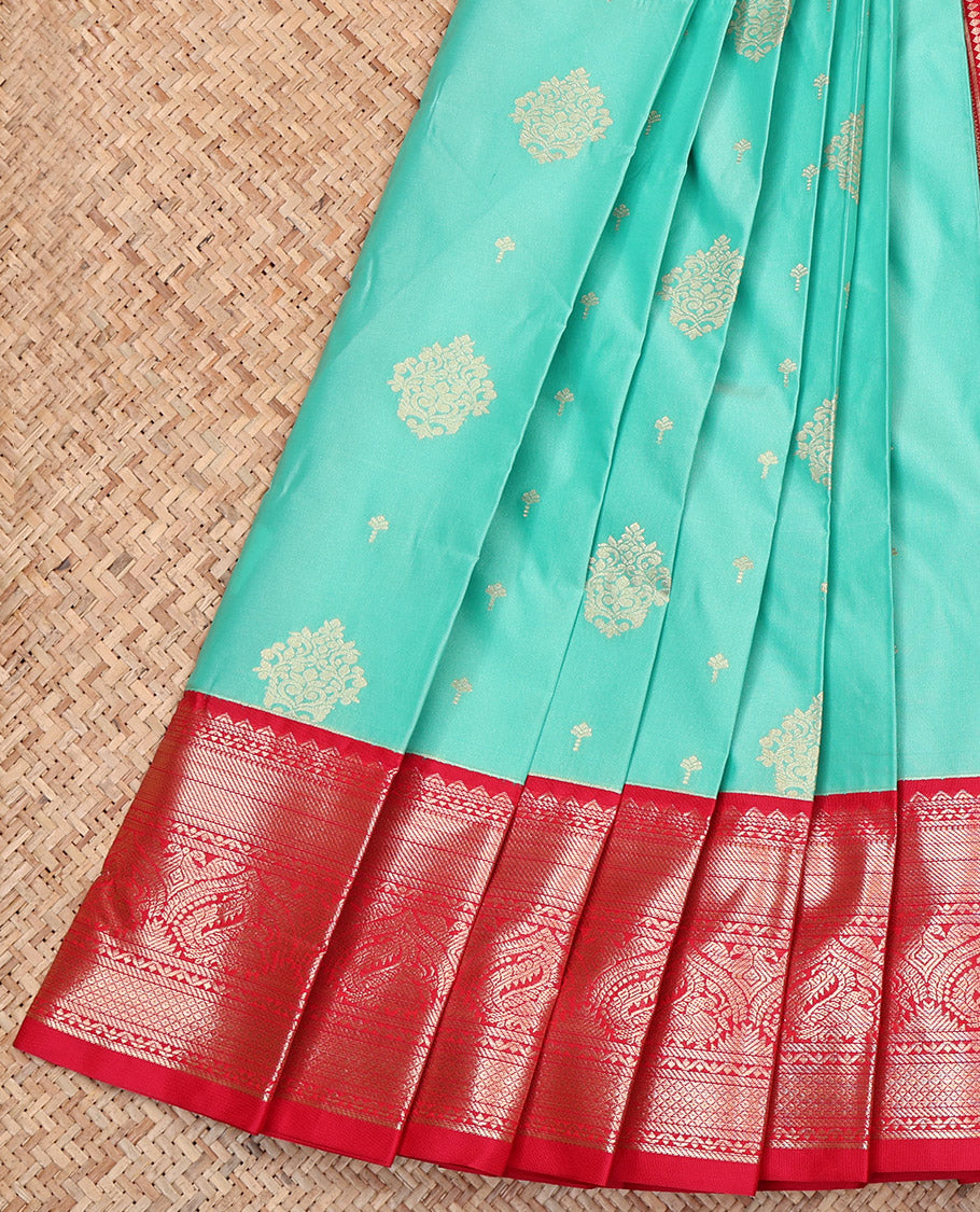 Turquoise Budget Silk Saree, Gleamed Up with Zari Buttas, Complemented by Contrast Traditional Zari Border, Jaal Pallu, and a Contrast Blouse