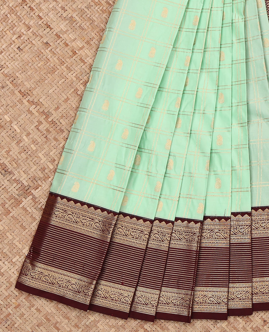 Pista Green Budget Silk Saree, Adorned with Butta Enclosed Checks, Complemented by a Contrast Traditional Zari Border, Grand Pallu, and a Contrast Blouse