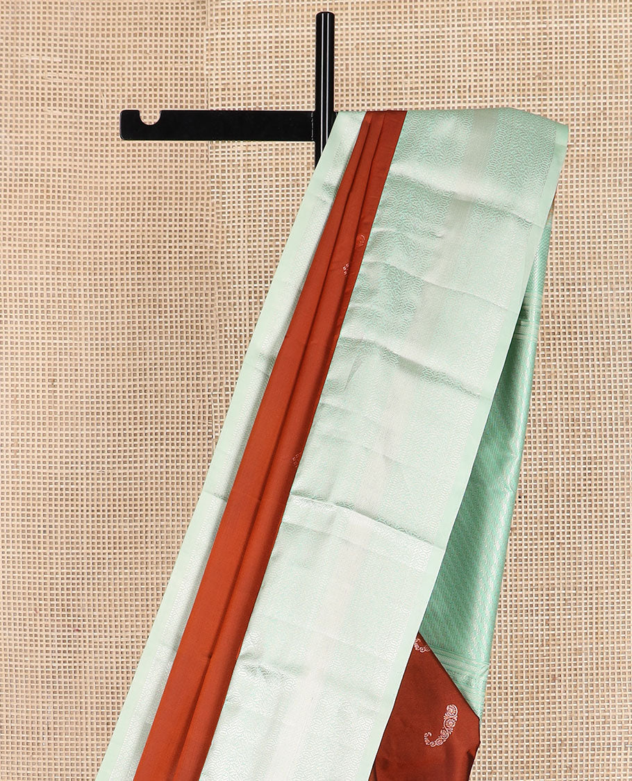 Rust zari buttas gift saree, contrast traditional zari design border, and zari striped pallu