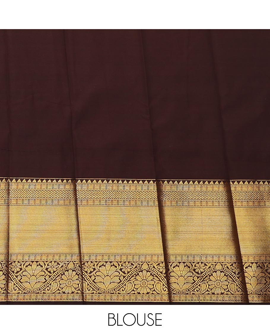 Yellow zari buttas, and striped gift saree, contrast traditional zari design border, and geometric patterned pallu