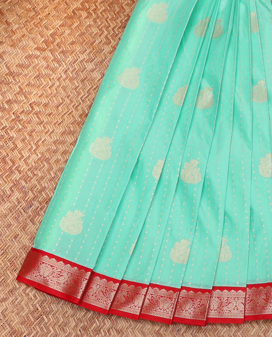 Turquoise Budget Silk Saree, Woven with Zari Buttas, Complemented by a Contrast Traditional Zari Peacock Border, Geometric-Patterned Pallu, and a Contrast Blouse
