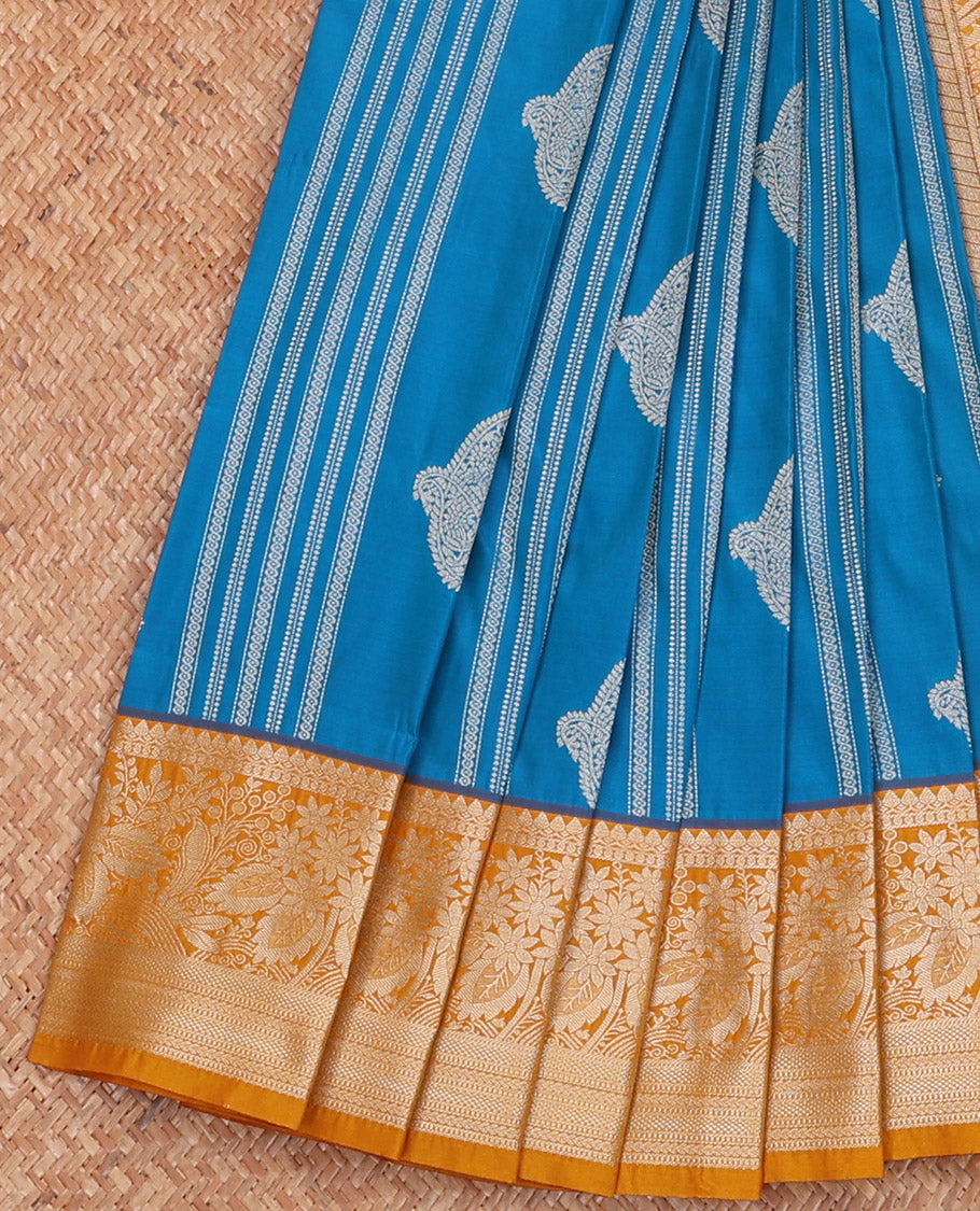 Azure Blue Budget Silk Saree Enriched with Paisley Buttas and Stripes All Over Its Body, Complemented by a Contrast Traditional Border of Floral Designs, Gracefully Embellished Pallu of Paisleys, and Paired with a Contrast Blouse