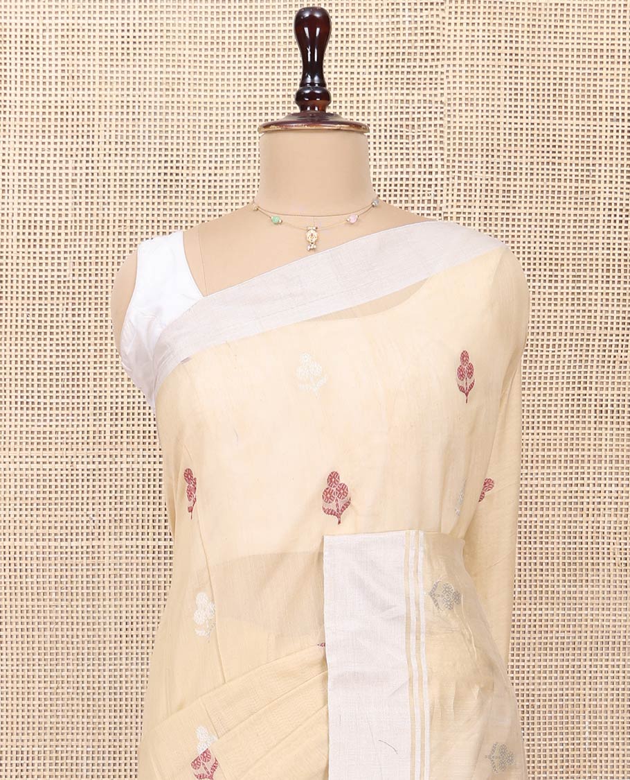 Sandal Chanderi Cotton Saree, Woven with Floral Buttas All Over Its Body, Highlighted by a Bavanji Border, Pallu Steeped with Zari Stripes, and Paired with a Matching Blouse