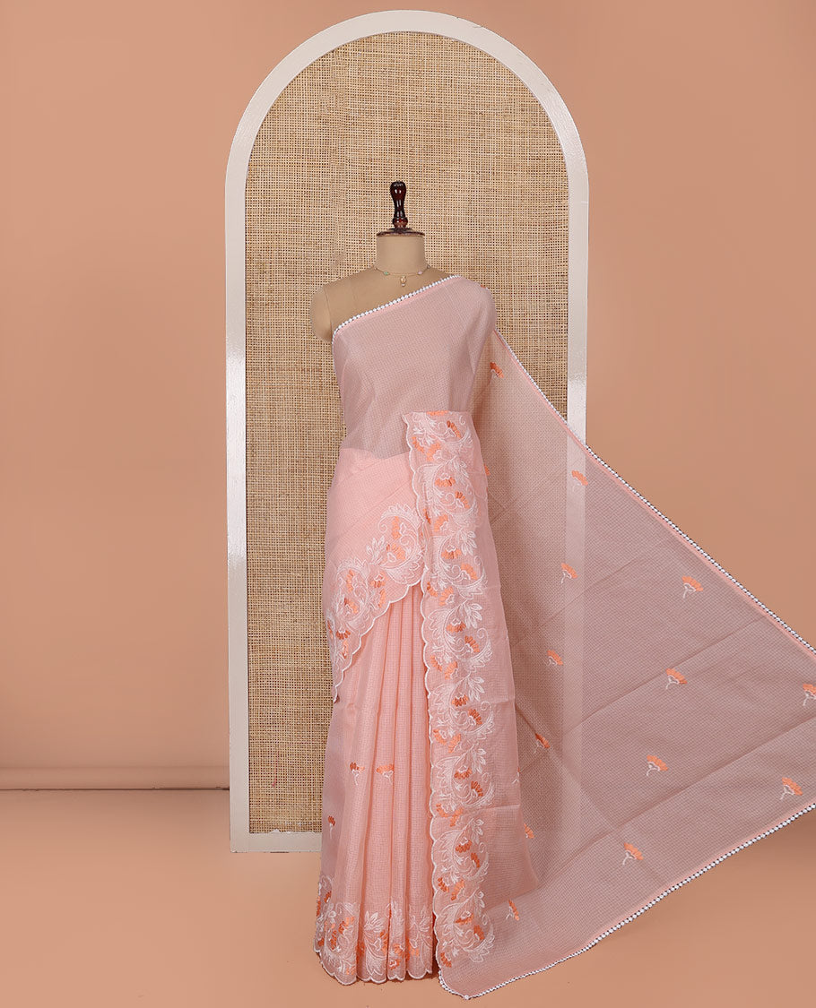 Peach Kota Cotton Saree, Finely Crafted with Floral Motifs Thread Embroidery on Its Body, Scallop Lace Embroidery Border, Pallu Features Same Embroidery, and Paired with a Matching Blouse