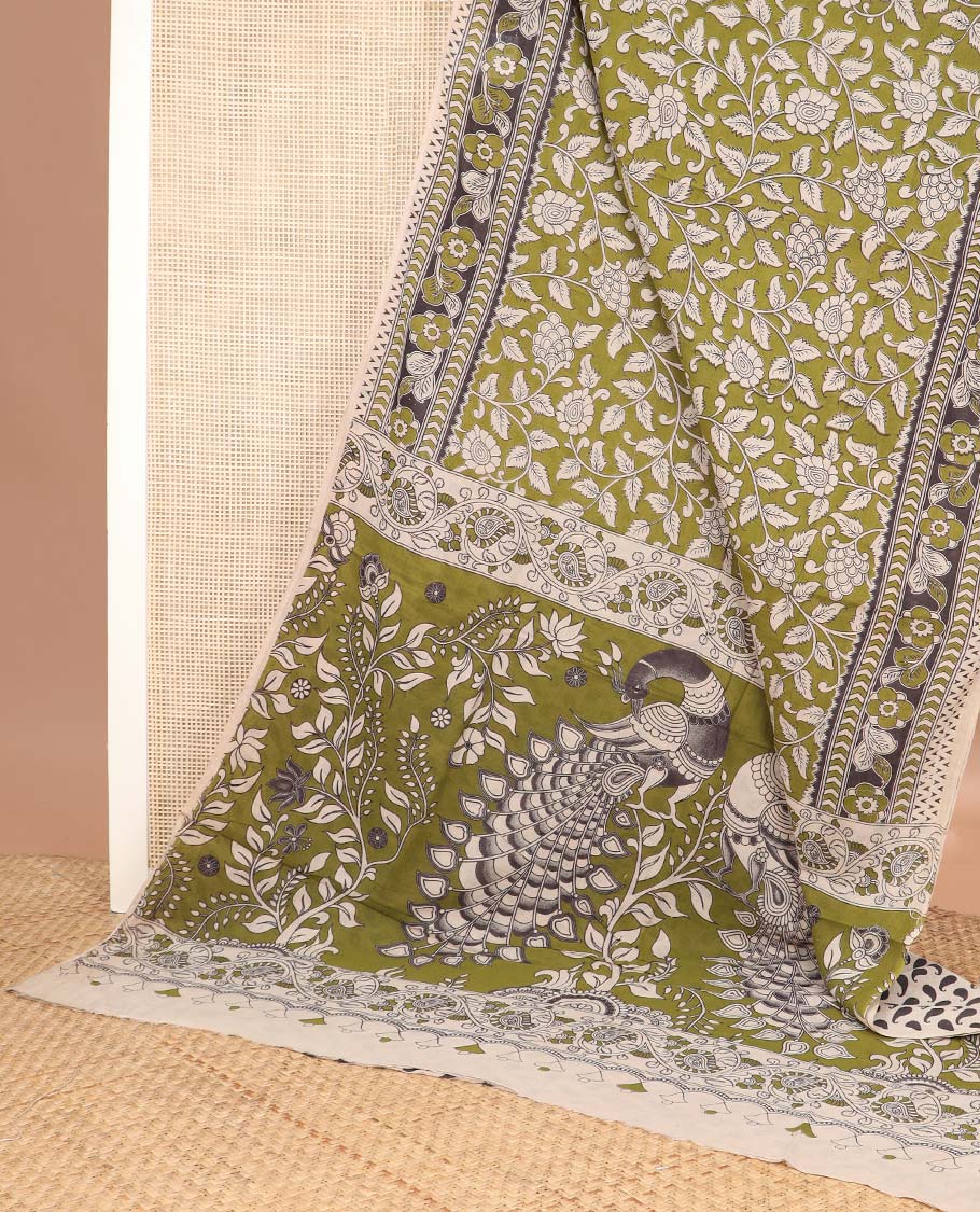 Green floral vine machine printed kalamkari cotton saree, contrast floral border, and pallu of peacocks print