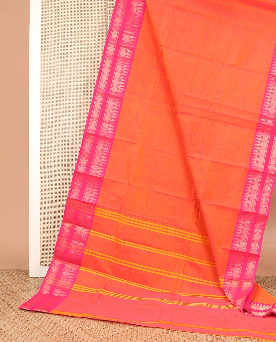 Orange plain Chettinad cotton saree, contrast traditional zari rettai pettu temple border, and zari striped pallu