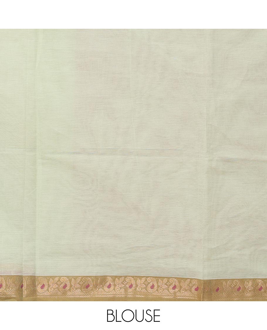 Pale green buttas Kanchi cotton saree, contrast paisley border, and floral design pallu