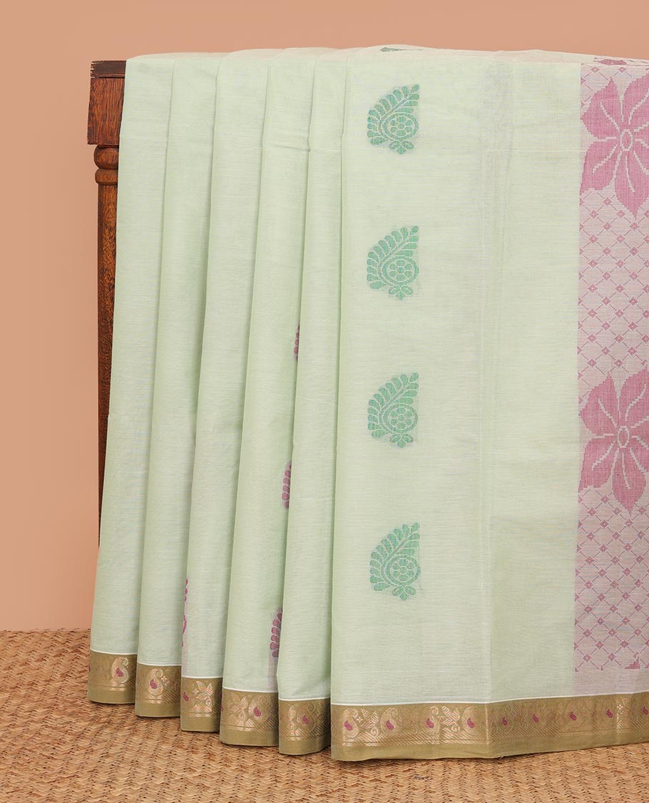 Pale green buttas Kanchi cotton saree, contrast paisley border, and floral design pallu