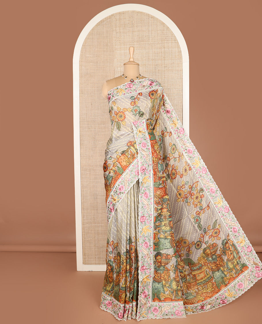 Grey buttas with bandhani and kalamkari floral-human motifs printed dola silk saree, contrast floral embroidered scallop border
