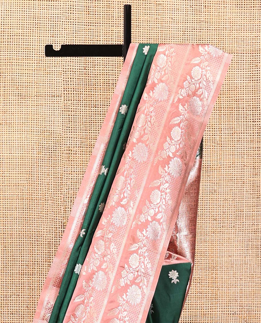 Bottle Green Mushuru Silk Saree, Enriched with Zari Buttas All Over Its Body, Complemented by Captivating Contrast Border of Floral Jaal Designs, Grandly Decked Up Pallu and Paired with a Contrast Blouse