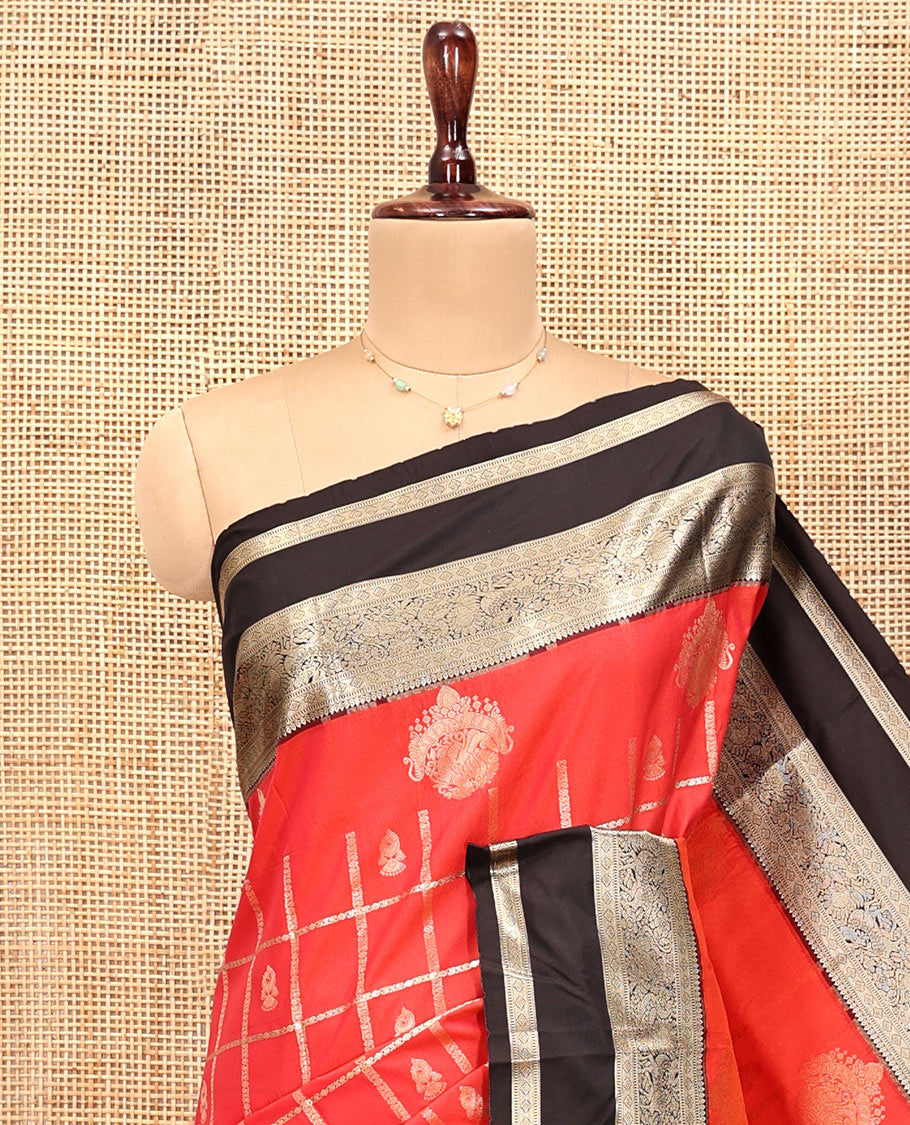 Reddish Orange Budget Silk Saree, Entralled with Jhumka Butta Enclosed Checks On Its Body, Complemented by Contrast Traditional Zari Rettai Pettu Border, Grand Pallu and Paired with a Contrast Blouse