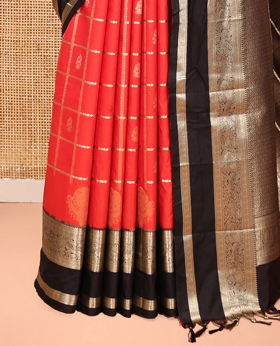 Reddish Orange Budget Silk Saree, Entralled with Jhumka Butta Enclosed Checks On Its Body, Complemented by Contrast Traditional Zari Rettai Pettu Border, Grand Pallu and Paired with a Contrast Blouse