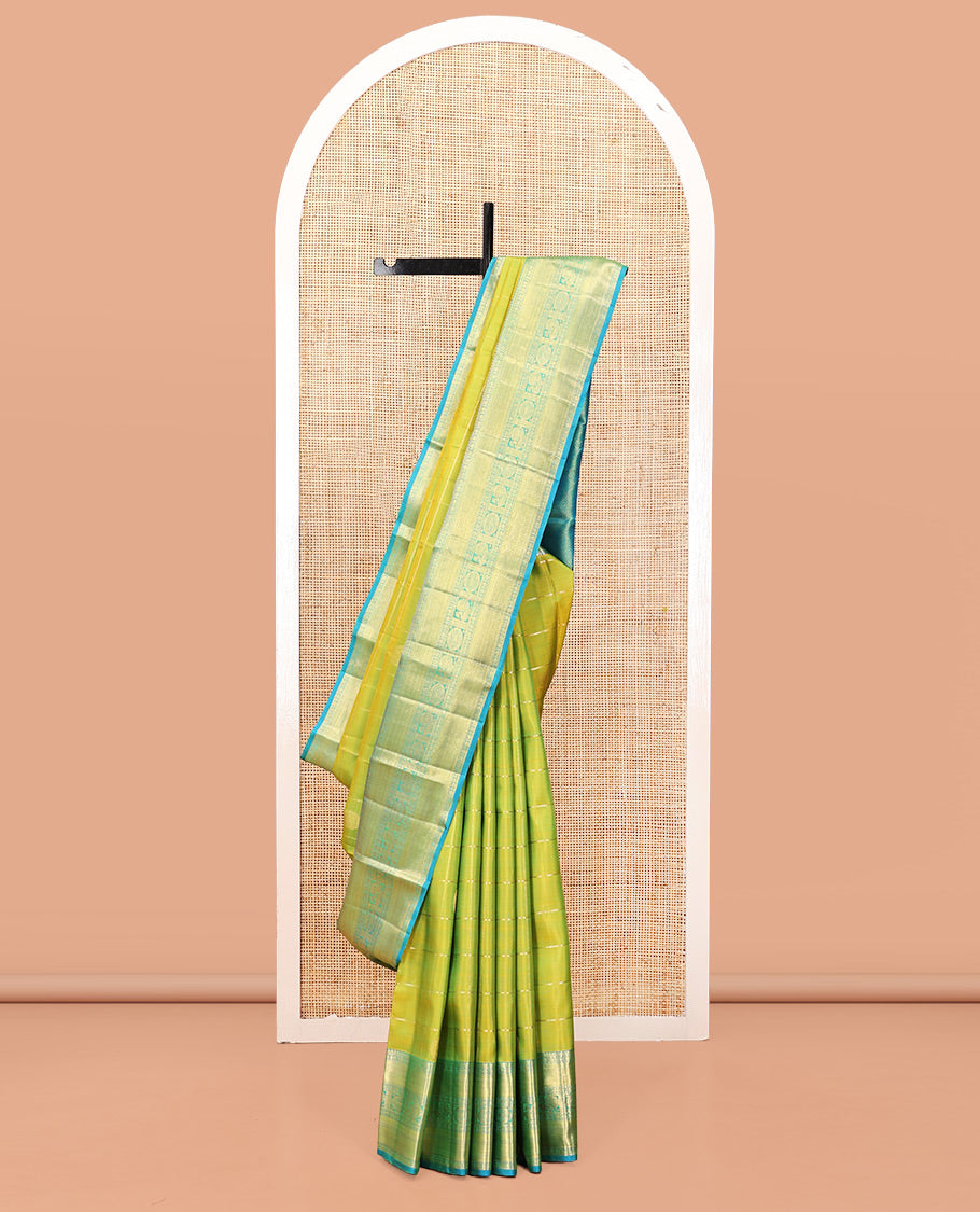 Green Kanchipuram Silk Saree, Finely Crafted with Chakra Butta Enclosed Checks, Contrast Border of Thilagam, Muthu, Rudraksham, and Mayil-Chakram Designs, Jaal Pallu, and Contrast Blouse