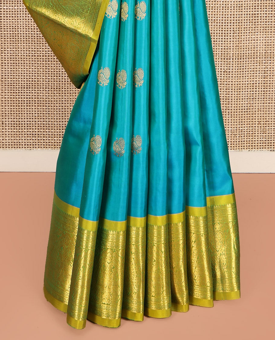 Blue Kanchipuram Silk Saree, Decorated with Mayil Buttas All Over Its Body, Complemented by a Contrast Border of Thilakam Mokku, Laddu Kamalam, and Mayil Designs, Pallu of Gandaberunda Designs, and Paired with a Contrast Blouse
